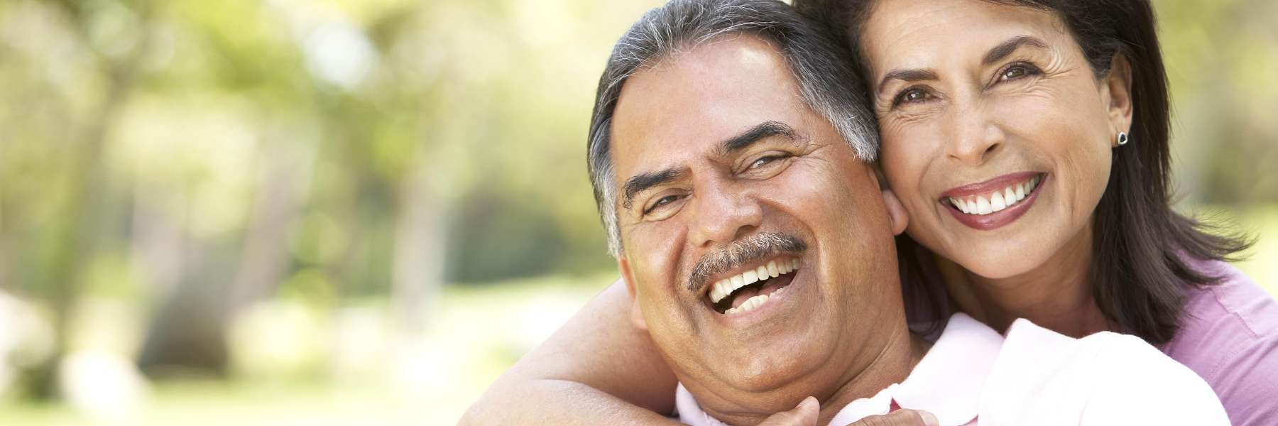 A smiling couple in the park