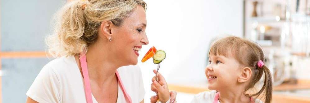 Girl playing dentist with her grandmother in Rehoboth DE