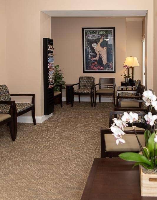 Dental office lobby with chairs and magazines